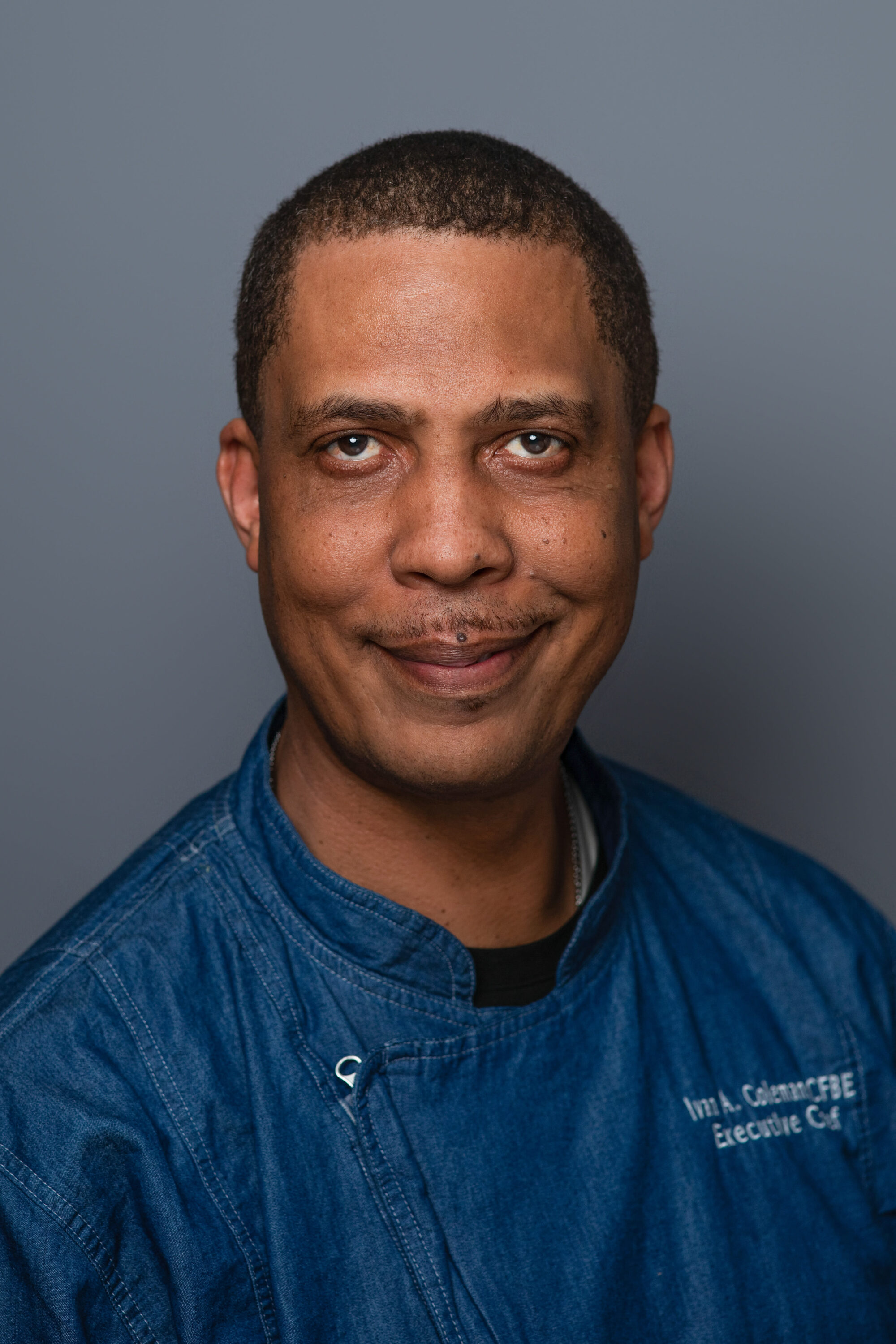 Executive chef in blue uniform portrait
