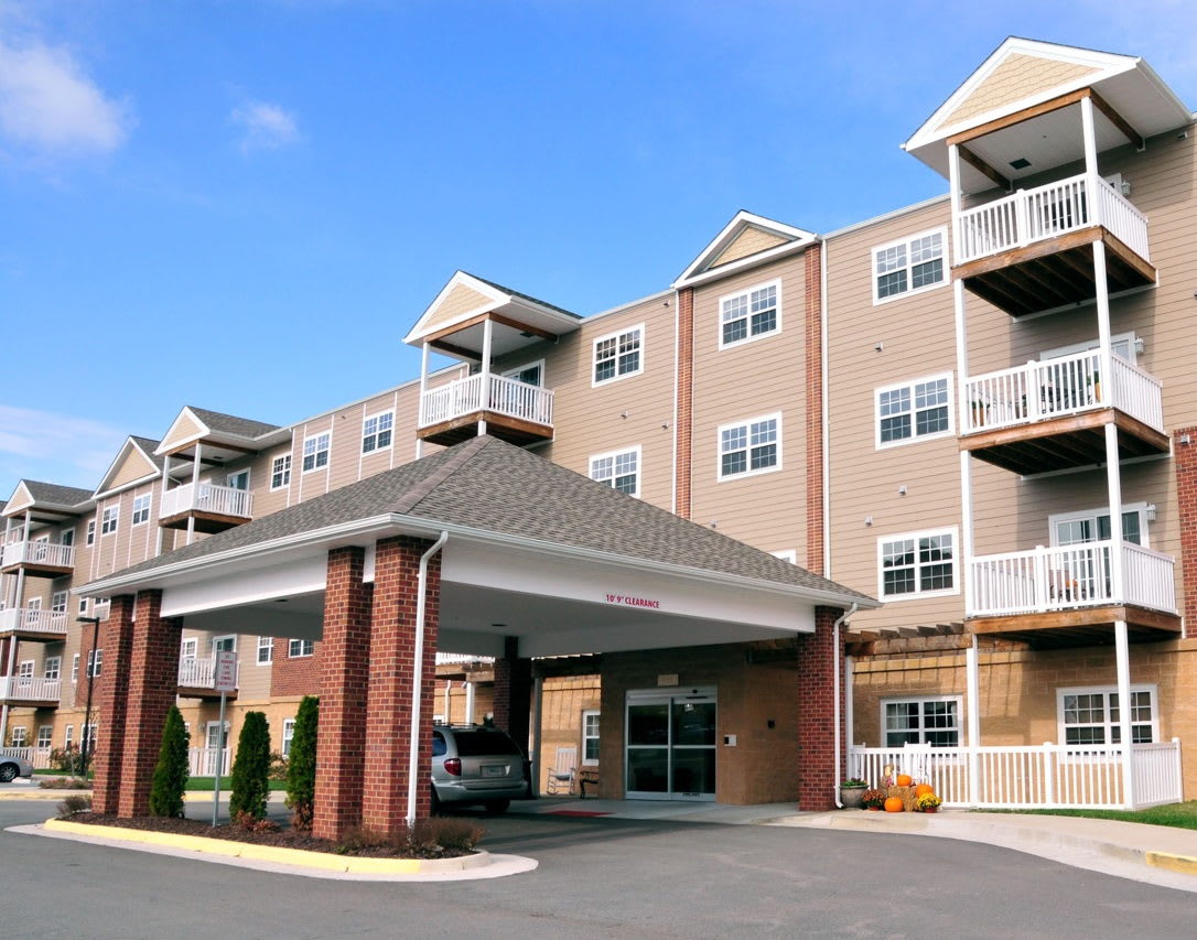 Exterior of modern apartment building with covered entrance